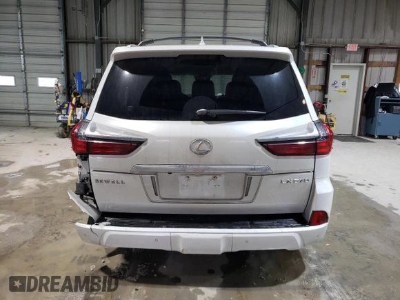 2018 Lexus LX 570 z VIN JTJHY7AX8J4262937, wystawiony jako Copart lot #49702925 z przebiegiem 104 837 mil mil oraz Szkoda całkowita • Salvage title. Historia ofert i sprzedaży dostępna na DreamBid. Obrazek 6.