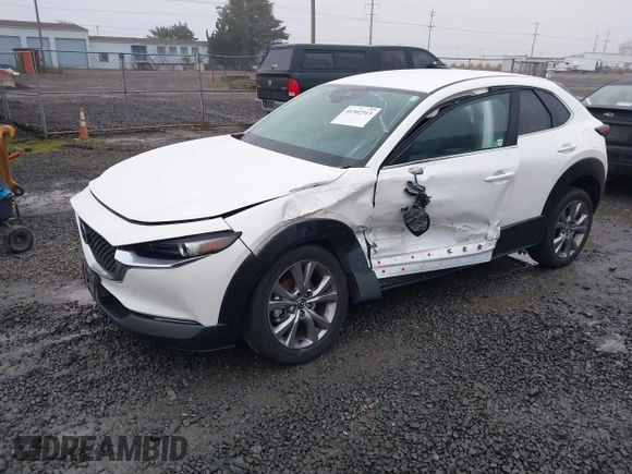 2021 Mazda CX-30 Select with VIN 3MVDMBBL3MM205256, listed as a IAAI auction lot 41302313 with 17,709 mi miles and . Bid and sale history available at DreamBid. Image 2.