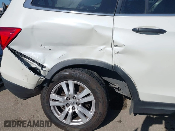 2016 Honda Pilot LX with VIN 5FNYF5H12GB051880, listed as a IAAI auction lot 41965816 with 112,705 mi miles and . Bid and sale history available at DreamBid. Image 6.