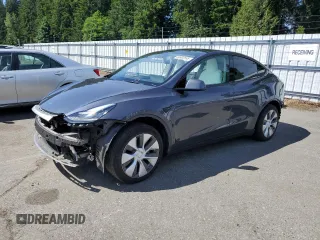 2021 Tesla Model Y Standard Range z VIN 5YJYGDED7MF113890, wystawiony jako Copart lot #58992695 z przebiegiem 11 834 mil mil oraz Szkoda całkowita • Salvage title. Historia ofert i sprzedaży dostępna na DreamBid. Obrazek 1.