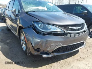 2017 Chrysler Pacifica Limited with VIN 2C4RC1GGXHR744875, listed as a IAAI auction lot 42080773 with 86,896 mi miles and . Bid and sale history available at DreamBid. Image 6.