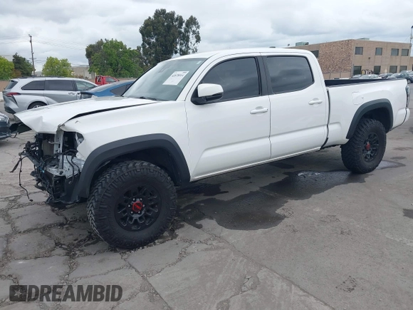 2021 Toyota Tacoma SR5 z VIN 3TMDZ5BN2MM100245, wystawiony jako IAAI lot #42078914 z przebiegiem 58 153 mil mil oraz . Historia ofert i sprzedaży dostępna na DreamBid. Obrazek 20.