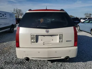 2009 Cadillac SRX RWD z VIN 1GYEE637590113453, wystawiony jako Copart lot #42596675 z przebiegiem 115 118 mil mil oraz Szkoda całkowita • Salvage title. Historia ofert i sprzedaży dostępna na DreamBid. Obrazek 6.