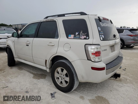 2009 Mercury Mariner with VIN 4M2CU81G49KJ16972, listed as a Copart auction lot 72354504 with 148,966 mi miles and Salvage title. Bid and sale history available at DreamBid. Image 2.