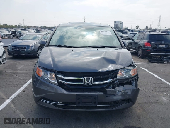 2014 Honda Odyssey EX-L with VIN 5FNRL5H64EB026520, listed as a IAAI auction lot 42562290 with 118,890 mi miles and . Bid and sale history available at DreamBid. Image 12.