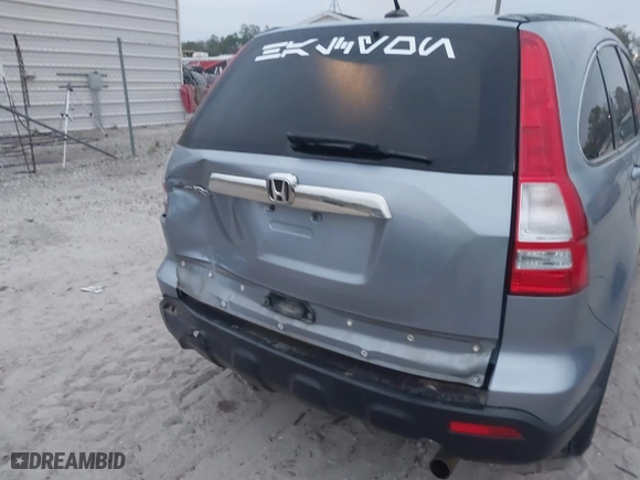 2009 Honda CR-V EX-L with VIN JHLRE387X9C006124, listed as a IAAI auction lot 41757092 with 142,038 mi miles. Bid and sale history available at carsss.com. Image 19.