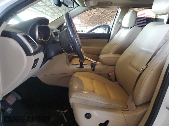 2014 Jeep Grand Cherokee Limited with VIN 1C4RJFBTXEC247661, listed as a Copart auction lot 57435625 with 103,782 mi miles and Salvage title. Bid and sale history available at DreamBid. Image 7.
