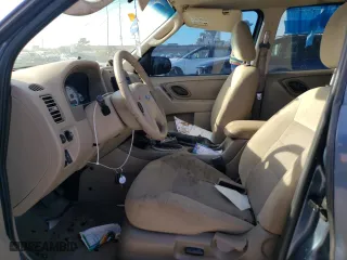 2006 Ford Escape XLT with VIN 1FMYU03156KA57685, listed as a Copart auction lot 77345044 with 0 mi miles and Salvage Title. Bid and sale history available at carsss.com. Image 7.