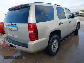 2007 Chevrolet Tahoe LS z VIN 1GNEC130X7R164139, wystawiony jako IAAI lot #42450827 z przebiegiem 232 144 mil mil oraz . Historia ofert i sprzedaży dostępna na DreamBid. Obrazek 4.