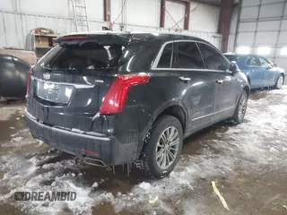 2018 Cadillac XT5 Luxury AWD with VIN 1GYKNDRSXJZ182299, listed as a IAAI auction lot 41628039 with 124,054 mi miles and . Bid and sale history available at DreamBid. Image 4.