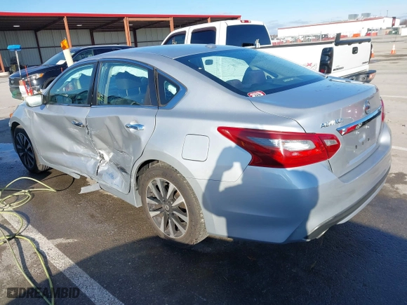 2018 Nissan Altima 2.5 SV with VIN 1N4AL3APXJC265944, listed as a IAAI auction lot 41052902 with 142,023 mi miles. Bid and sale history available at carsss.com. Image 3.