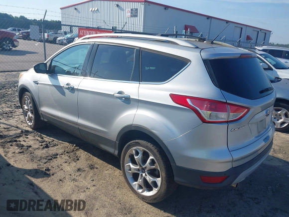 2013 Ford Escape Titanium with VIN 1FMCU0J94DUB58785, listed as a IAAI auction lot 42631897 with 163,037 mi miles and . Bid and sale history available at DreamBid. Image 3.