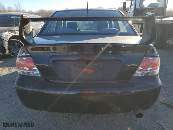 2006 Mitsubishi Lancer OZ-Rally with VIN JA3AJ86E16U059013, listed as a Copart auction lot 80056014 with 107,179 mi miles and Clean Title. Bid and sale history available at carsss.com. Image 6.