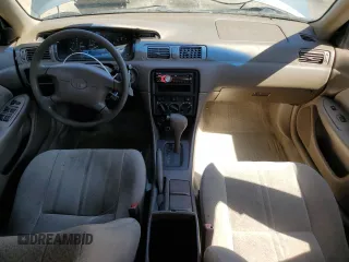 2001 Toyota Camry CE z VIN JT2BG22K410538709, wystawiony jako Copart lot #53295905 z przebiegiem 223 115 mil mil oraz Szkoda całkowita • Salvage title. Historia ofert i sprzedaży dostępna na DreamBid. Obrazek 8.