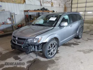 2018 Dodge Journey GT with VIN 3C4PDDEG8JT390284, listed as a IAAI auction lot 41729625 with 143,370 mi miles and . Bid and sale history available at DreamBid. Image 2.