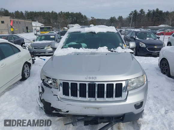 2011 Jeep Grand Cherokee 70th Anniversary with VIN 1J4RR4GGXBC609633, listed as a IAAI auction lot 41469526 with 138,439 mi miles. Bid and sale history available at carsss.com. Image 12.