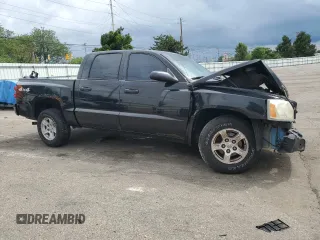 2006 Dodge Dakota SLT z VIN 1D7HW48N56S641575, wystawiony jako Copart lot #60141125 z przebiegiem 135 482 mil mil oraz Szkoda całkowita • Salvage title. Historia ofert i sprzedaży dostępna na DreamBid. Obrazek 4.