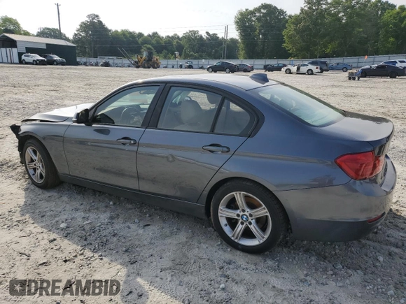 2014 BMW 3 Series 328i with VIN WBA3A5G50ENP33259, listed as a Copart auction lot 57330615 with 217,779 mi miles and Salvage title. Bid and sale history available at DreamBid. Image 2.
