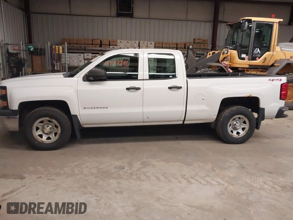 2014 Chevrolet Silverado 1500 Work Truck with VIN 1GCVKPEHXEZ182977, listed as a IAAI auction lot 41793244 with 135,879 mi miles and . Bid and sale history available at DreamBid. Image 14.