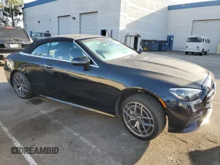2021 Mercedes-Benz E 450 with VIN W1K1K5JB4MF159267, listed as a Copart auction lot 74945184 with 49,924 mi miles and Salvage title. Bid and sale history available at DreamBid. Image 4.