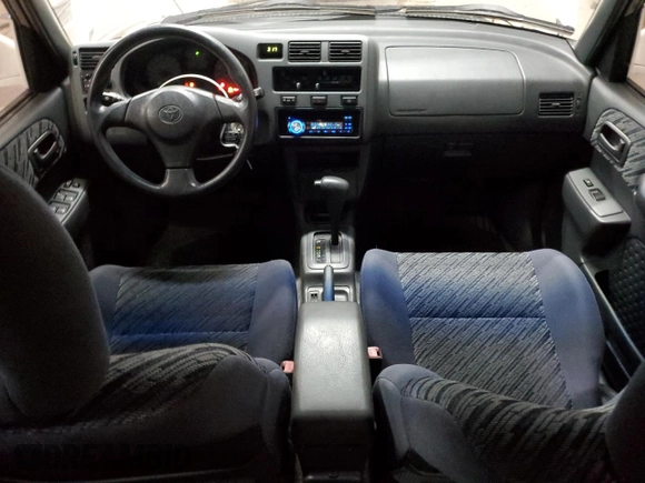 2000 Toyota RAV4 with VIN JT3GP10V2Y7070652, listed as a Copart auction lot 59151205 with 65,285 mi miles and Clean title. Bid and sale history available at DreamBid. Image 8.