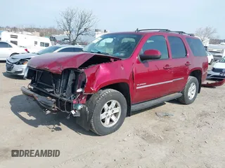 2011 GMC Yukon SLE with VIN 1GKS2AE02BR208997, listed as a IAAI auction lot 41910468 with 178,867 mi miles. Bid and sale history available at carsss.com. Image 2.