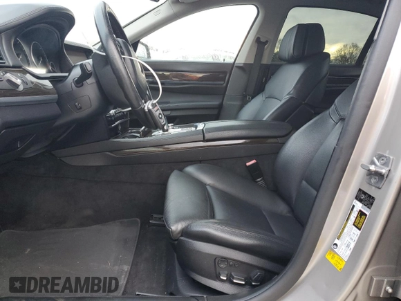 2012 BMW 7 Series 740i with VIN WBAKA4C56CDS99041, listed as a Copart auction lot 41436735 with 170,059 mi miles and Clean title. Bid and sale history available at DreamBid. Image 7.