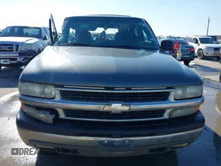 2002 Chevrolet Tahoe LT z VIN 1GNEC13Z42R319646, wystawiony jako IAAI lot #41623259 z przebiegiem 250 430 mil mil oraz . Historia ofert i sprzedaży dostępna na DreamBid. Obrazek 13.