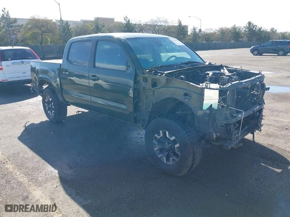 2021 Toyota Tacoma 4WD SR with VIN 3TMCZ5AN9MM408803, listed as a IAAI auction lot 41746099 with 62,823 mi miles. Bid and sale history available at carsss.com. Image 1.