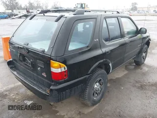 1998 Isuzu Rodeo S z VIN 4S2CM58W6W4336183, wystawiony jako IAAI lot #41874570 z przebiegiem 162 097 mil mil oraz . Historia ofert i sprzedaży dostępna na DreamBid. Obrazek 4.
