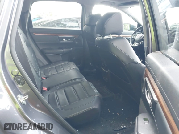 2018 Honda CR-V Touring z VIN 7FARW1H9XJE040530, wystawiony jako IAAI lot #42227446 z przebiegiem 101 299 mil mil oraz . Historia ofert i sprzedaży dostępna na DreamBid. Obrazek 8.