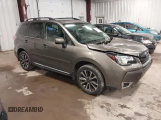 2017 Subaru Forester Touring with VIN JF2SJGWC0HH810100, listed as a IAAI auction lot 41646141 with 69,556 mi miles. Bid and sale history available at carsss.com. Image 1.