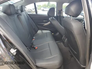 2014 BMW 3 Series 320i xDrive with VIN WBA3C3G51ENS72023, listed as a Copart auction lot 58595225 with 104,315 mi miles and Salvage title. Bid and sale history available at DreamBid. Image 10.