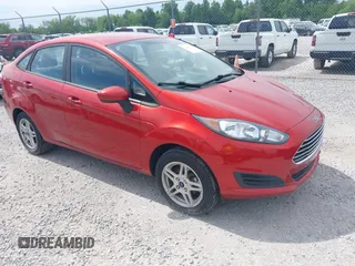2018 Ford Fiesta SE z VIN 3FADP4BJ1JM132084, wystawiony jako IAAI lot #42296074 z przebiegiem 62 852 mil mil oraz . Historia ofert i sprzedaży dostępna na DreamBid. Obrazek 1.