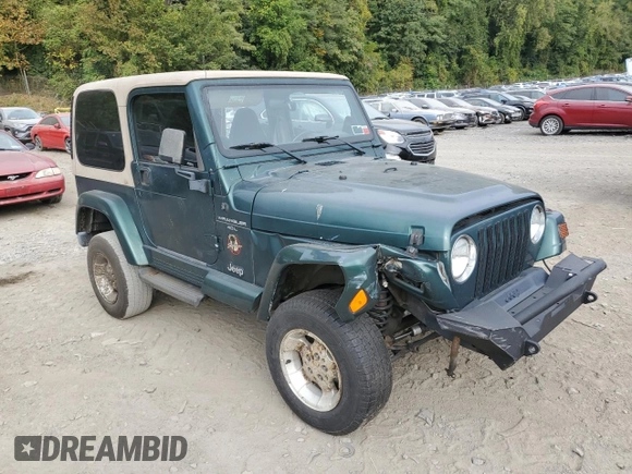 2000 Jeep Wrangler Sahara with VIN 1J4FA59S1YP747919, listed as a Copart auction lot 72278044 with 157,360 mi miles and Salvage Title. Bid and sale history available at carsss.com. Image 4.