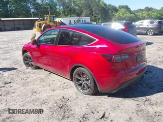 2024 Tesla Model Y z VIN 7SAYGDED2RA325538, wystawiony jako IAAI lot #42180492 z przebiegiem 8 738 mil mil oraz . Historia ofert i sprzedaży dostępna na DreamBid. Obrazek 3.