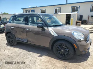 2012 MINI Countryman with VIN WMWZB3C59CWM04522, listed as a Copart auction lot 56605865 with 33,186 mi miles and Salvage title. Bid and sale history available at DreamBid. Image 4.