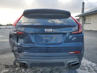 2021 Cadillac XT4 AWD Premium Luxury with VIN 1GYFZDR4XMF007080, listed as a Copart auction lot 87943335 with 36,379 mi miles and Salvage Title. Bid and sale history available at carsss.com. Image 6.