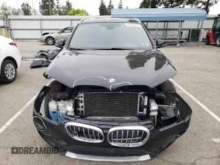 2018 BMW X1 sDrive28i with VIN WBXHU7C32J5L06825, listed as a Copart auction lot 49403143 with 93,723 mi miles. Bid and sale history available at carsss.com. Image 5.
