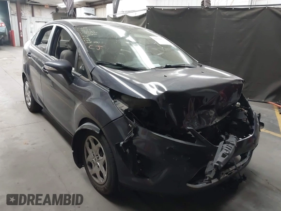 2013 Ford Fiesta SE z VIN 3FADP4BJ1DM186232, wystawiony jako IAAI lot #42304613 z przebiegiem 105 919 mil mil oraz . Historia ofert i sprzedaży dostępna na DreamBid. Obrazek 1.