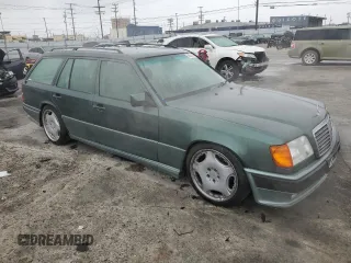 1993 Mercedes-Benz 300 with VIN WDBEA92E7PF259851, listed as a Copart auction lot 50561015 with 214,346 mi miles and Salvage Title. Bid and sale history available at DreamBid. Image 4.