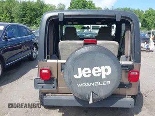 2005 Jeep Wrangler Sport with VIN 1J4FA49SX5P317120, listed as a IAAI auction lot 42677397 with 71,403 mi miles and . Bid and sale history available at DreamBid. Image 16.