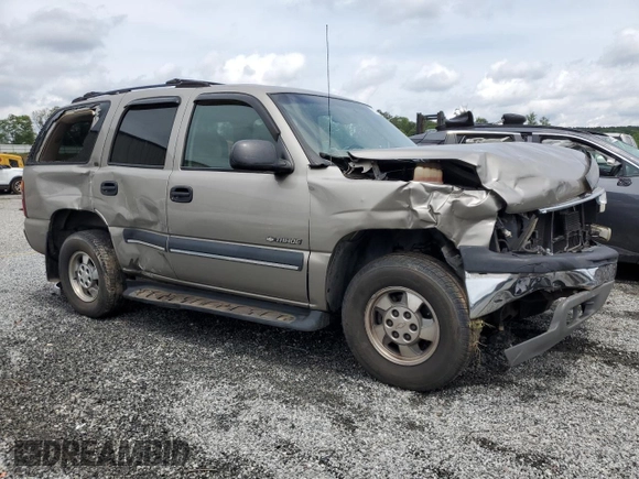 2002 Chevrolet Tahoe LS with VIN 1GNEC13Z52J232577, listed as a Copart auction lot 58770895 with 240,960 mi miles and Salvage title. Bid and sale history available at DreamBid. Image 4.