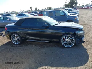 2015 BMW 2 Series 228i с VIN WBA1K5C59FV242829, выставлен на аукционе IAAI как лот 41899187 с пробегом 71 207 миль миль и . История ставок и продаж доступна на DreamBid. Изображение 14.