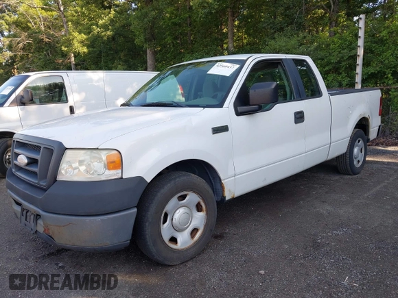 2007 Ford F-150 STX with VIN 1FTRX12W07FA84452, listed as a IAAI auction lot 42560437 with 314,539 mi miles and . Bid and sale history available at DreamBid. Image 2.