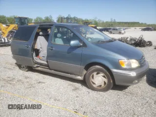 2002 Toyota Sienna LE with VIN 4T3ZF13C22U497021, listed as a Copart auction lot 52571055 with 232,973 mi miles and Salvage Title. Bid and sale history available at DreamBid. Image 4.