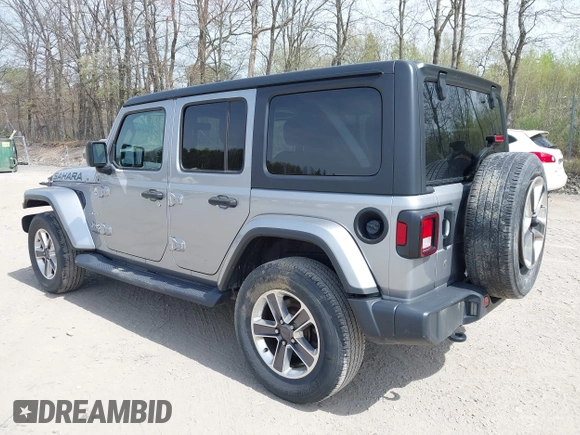 2018 Jeep Wrangler Unlimited Sahara with VIN 1C4HJXEG4JW141540, listed as a IAAI auction lot 42148402 with 43,909 mi miles and . Bid and sale history available at DreamBid. Image 3.