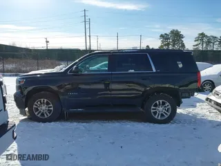 2019 Chevrolet Tahoe LT with VIN 1GNSKBKC7KR138999, listed as a IAAI auction lot 41339420 with 74,297 mi miles. Bid and sale history available at carsss.com. Image 14.