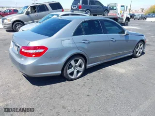 2010 Mercedes-Benz E-Class E 350 Luxury with VIN WDDHF5GBXAA022398, listed as a IAAI auction lot 42011533 with 167,763 mi miles. Bid and sale history available at carsss.com. Image 4.