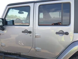 2015 Jeep Wrangler Unlimited Sahara with VIN 1C4BJWEG2FL558860, listed as a IAAI auction lot 41937360 with 113,627 mi miles. Bid and sale history available at carsss.com. Image 15.